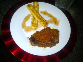 Saucy T-bone Steak Served With Haloumi Cheese