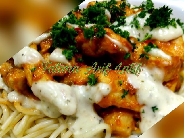 Saucy Garlic And Peri Peri Chicken Strips On A Bed Of Spaghetti