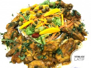 Saucy Chicken Set On A Bed Of Spaghetti 