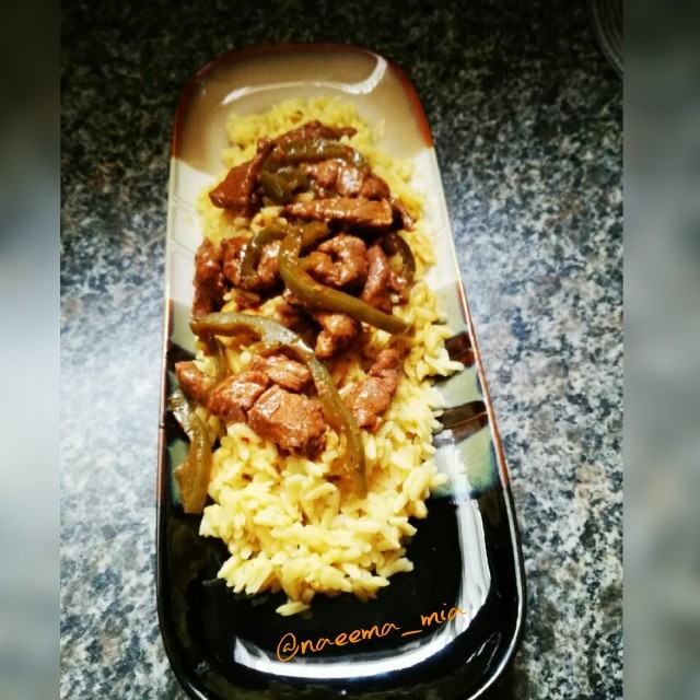 Saucy Steak On A Bed Of Savoury Rice 