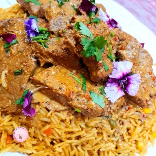 Mexican Fillet Steak Served On A Bed Of Mexican Rice