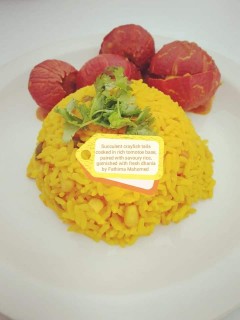 Succulent Crayfish Tails Cooked In Rich Fresh Cream, Tomotoe Base, Paired With Savoury Rice