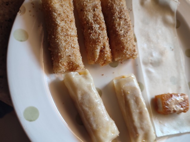 Crumbed Fish Fingers In Springroll.