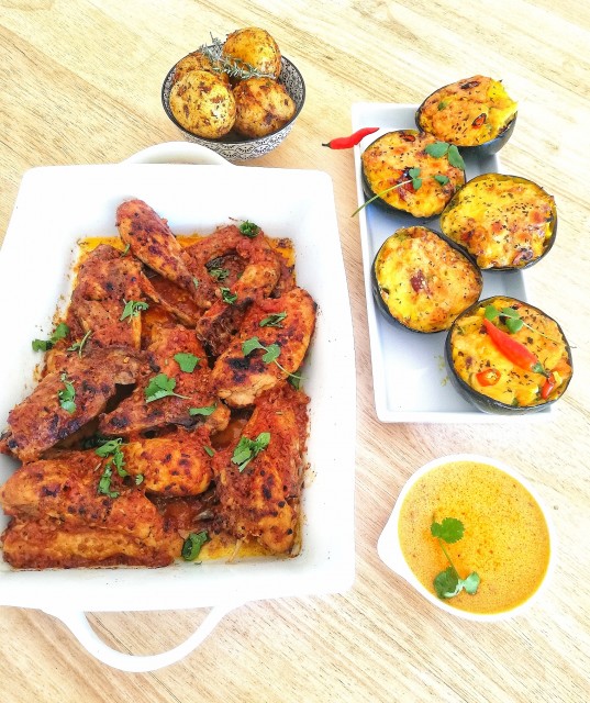 Taka Taka Chicken Served With Mexican Style Stuffed Gemsquash And Cajun Flavored Roasted Baby Potatoes