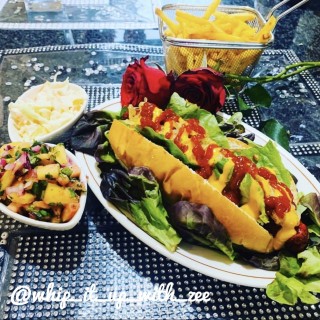 Pineapple And Jalapeño Salsa Gourmet Hotdogs With Caramelized Onions