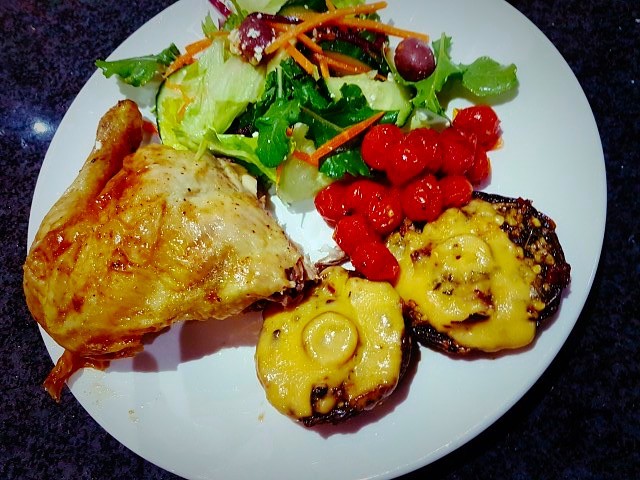 Roasted Chicken With Stuffed Mushrooms And Roasted Baby Tomatoes