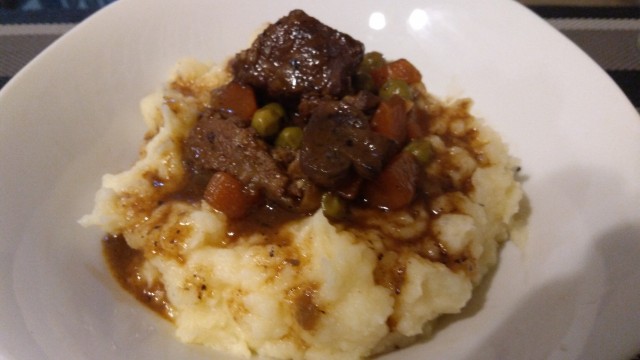Hearty Beef Stew On Creamy Mashed Potatoes