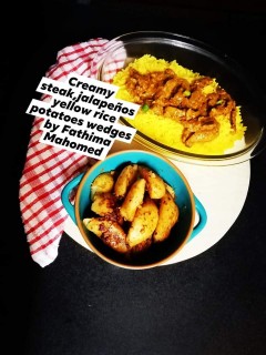 Creamy, Jalapeno Masala Steak, Yellow Rice And Fried Wedge Potatoes